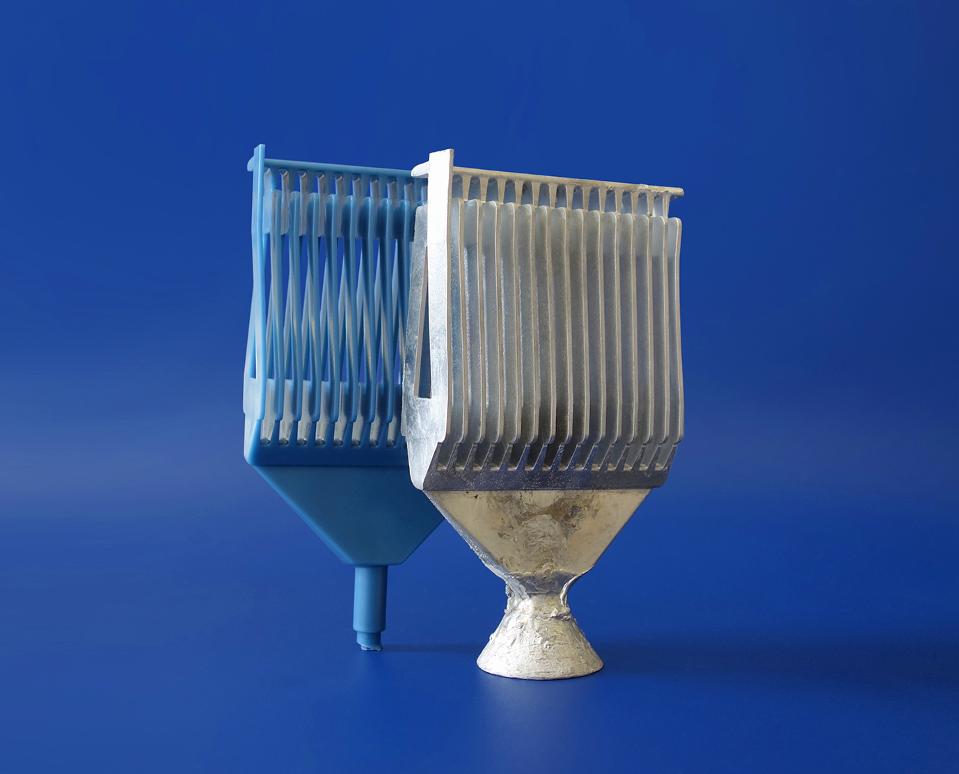 Trennmittelfrei gespritztes Wachsteil und gegossene Spule aus Aluminium