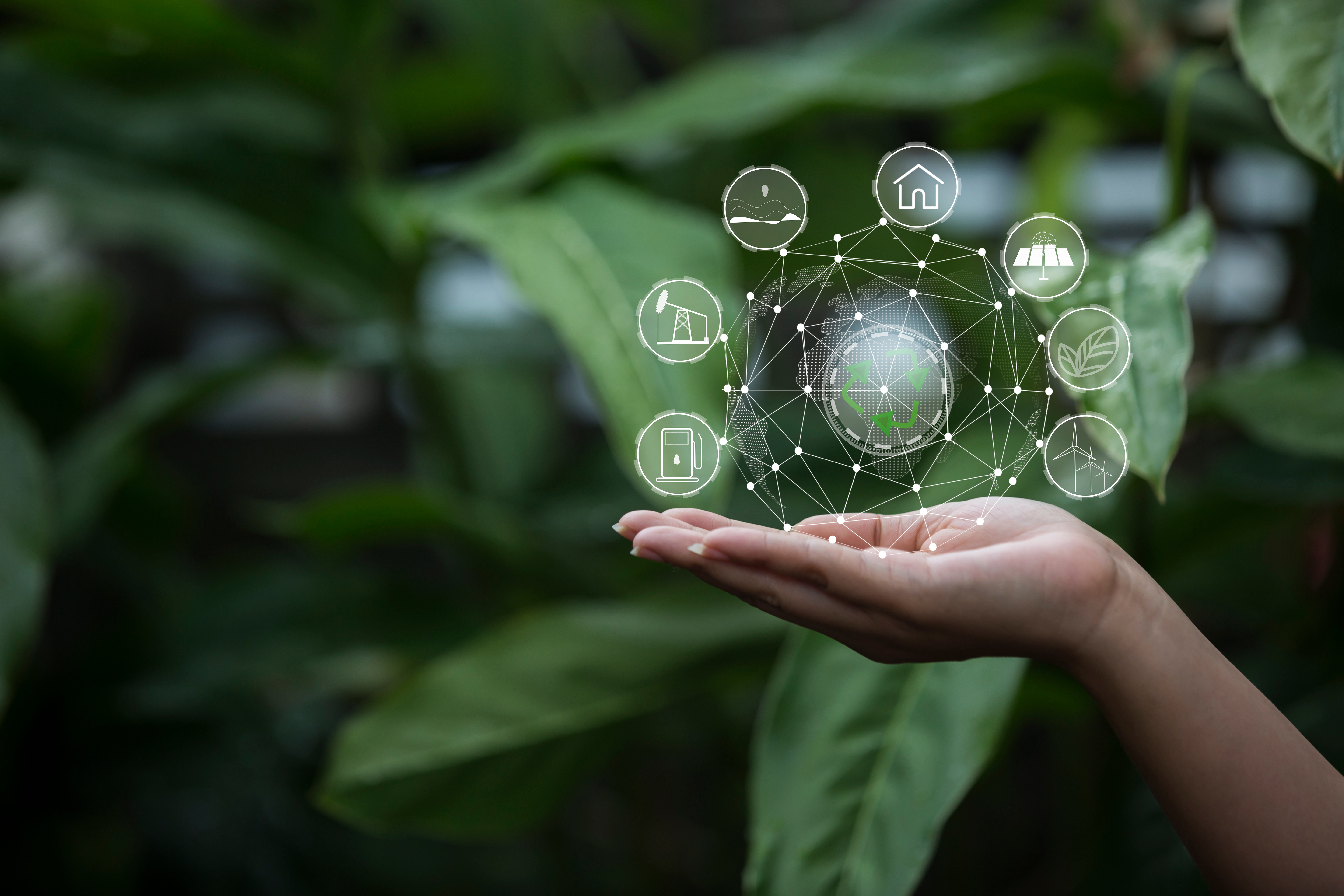 Technology, hand holding with environment Icons over the Network connection on green background.