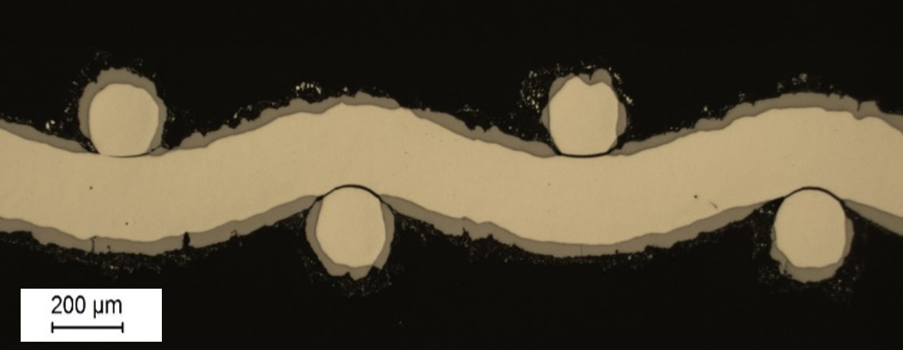 Cross sectional image of a Raney nickel-coated metal substrate (grid structure). Cross sectional image of a Raney nickel-coated metal substrate (grid structure).