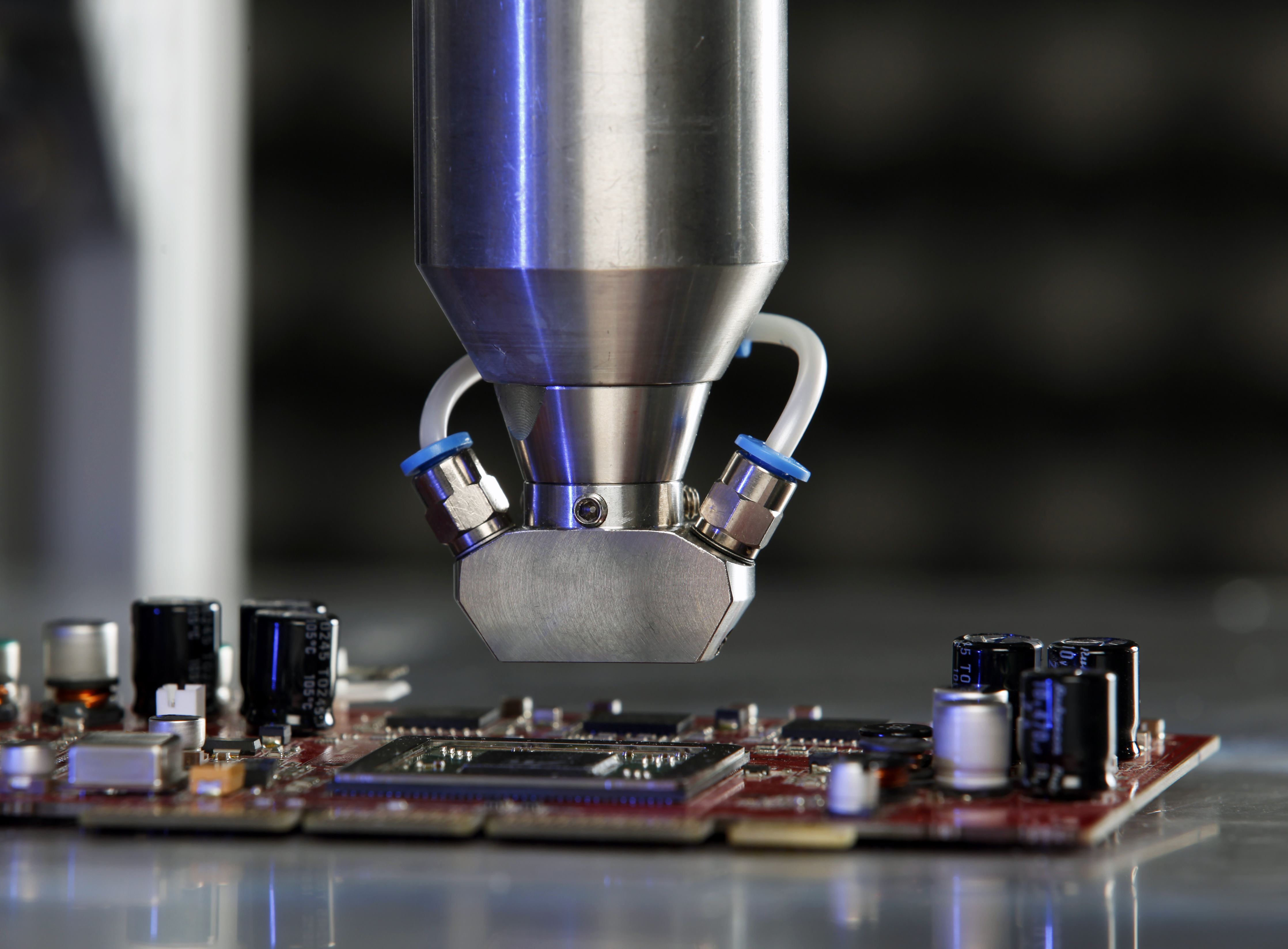 Selective nanocoating using atmospheric pressure plasma to protect electronic components from corrosion