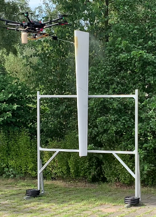 Coating drone during a spray test: The coating material is applied by the drone via a lance