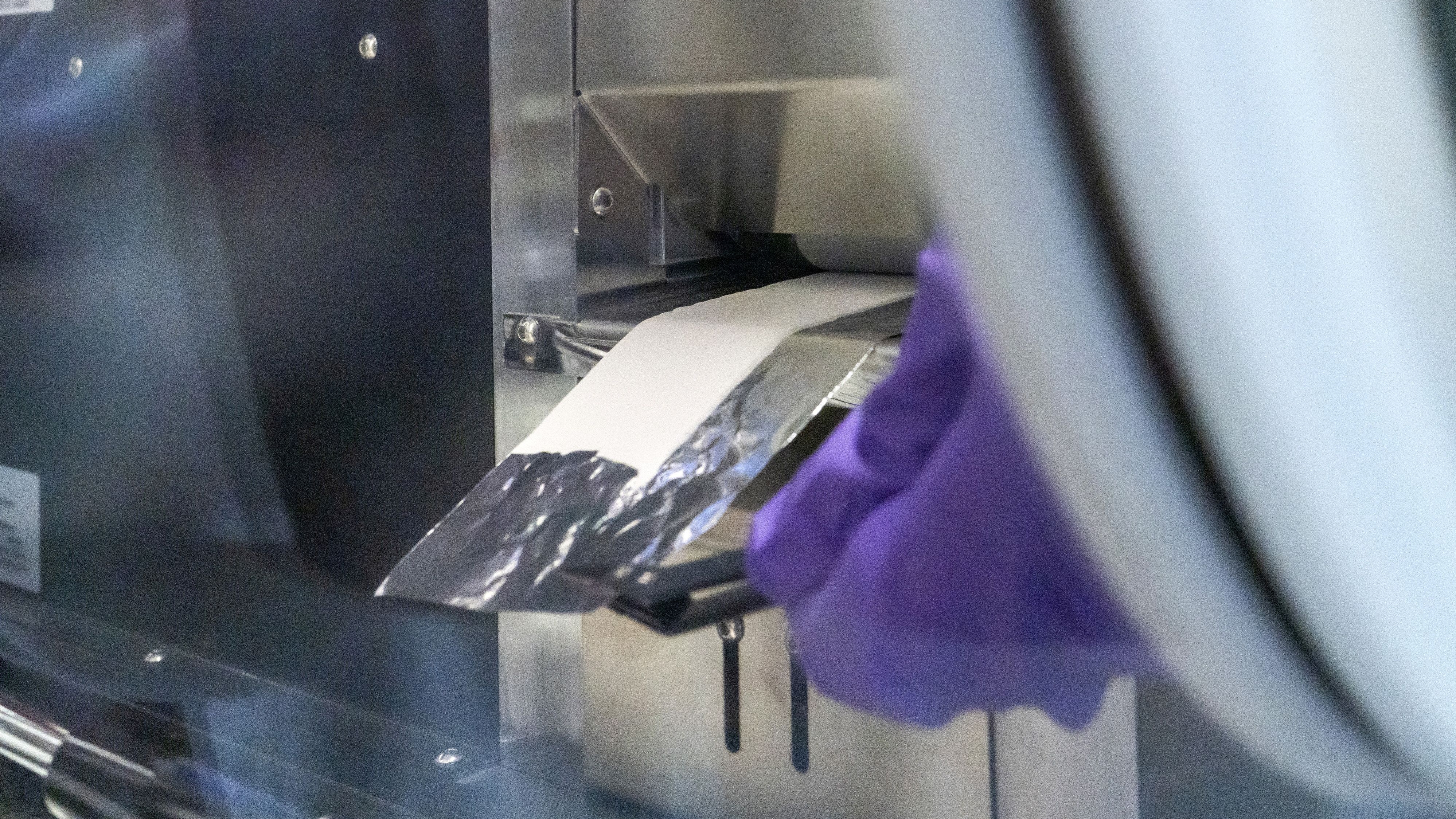 Calander for compaction and transfer of solid-state cell components.